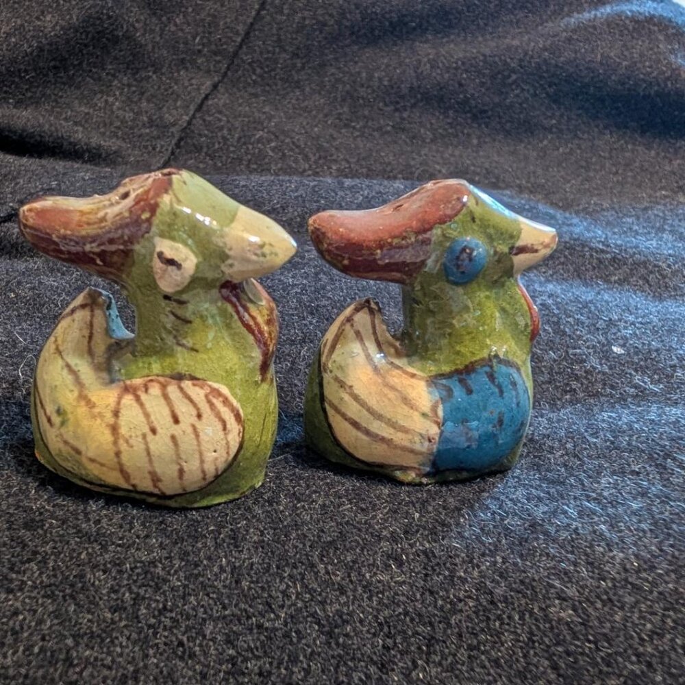 Ceramic bird figurines, likely Mandarin ducks